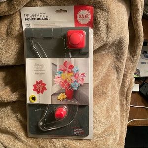 Pinwheel punchboard- create pinwheels in 20 different shapes